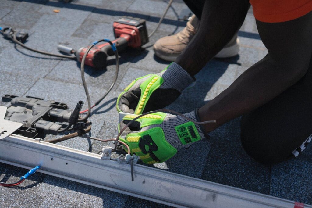 pexels photo 33379360 Electrician Wiring Solar Installation